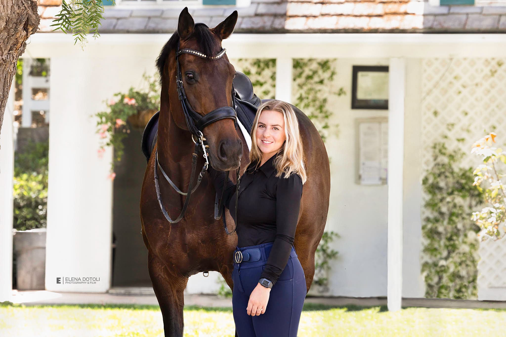 McKenzie Milburn with her dressage horse at the barn