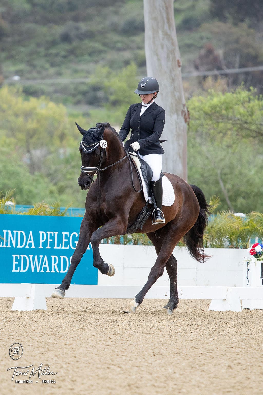 McKenzie Milburn and her dressage horse competing